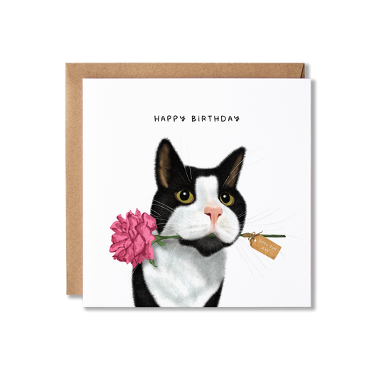 Birthday card with illustration of a black and white cat holding a pink rose in it's mouth with a brown paper tag on that says Love you xx and the message Happy Birthday.