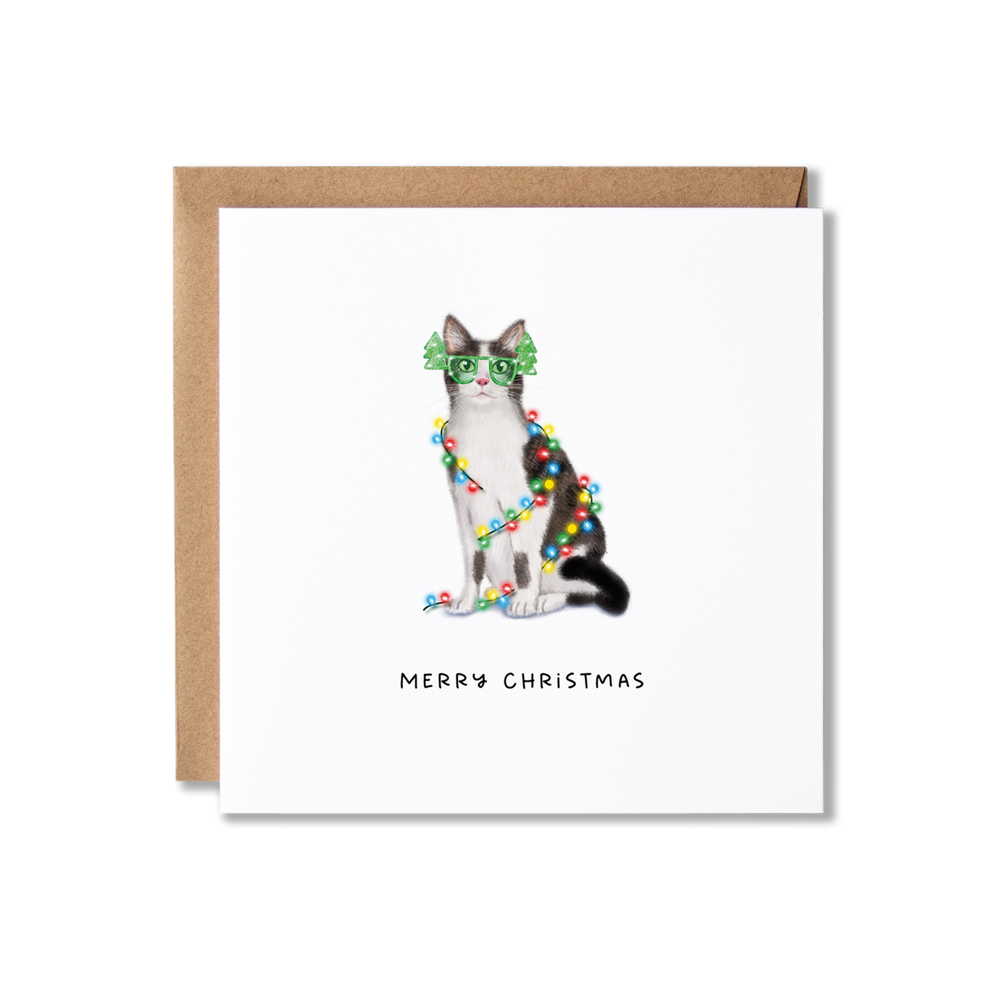 Christmas card with illustration of a grey and white cat wrapped in Christmas lights with the message Merry Christmas underneath.