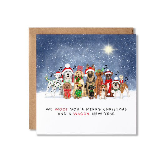 Christmas card with illustration of a group of dogs sat in a row with Christmas hats and Christmas lights wrapped around them singing under a starry night sky, with the message We Wish You a Woofy Chistmas and a Waggy New Year.
