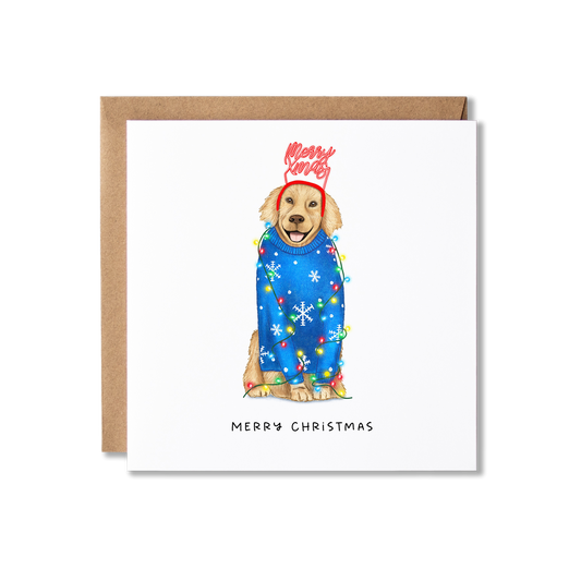 Christmas card with illustration of a couple of Golden Retrievers sat in a blue Christmas jumper with snowflakes on and wearing a Merry Xmas headband, wrapped in Christmas Lights with the message Merry Christmas.