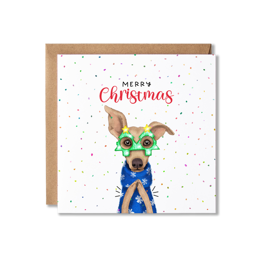 Christmas card with illustration of an Italian Greyhound dog in a blue Christmas jumper and wearing Christmas tree glasses, clapping with the message Merry Christmas.