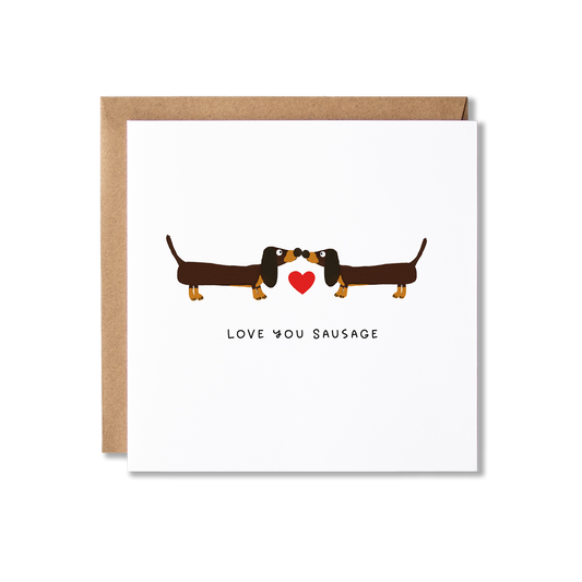 Greeting card with illustration of a couple of Dachshund sausage dogs with a heart in the middle and the message Love You Sausage.