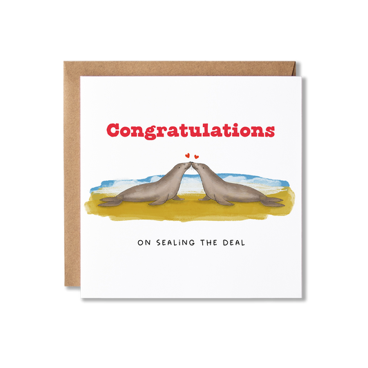Wedding card with illustration of two seals on a beach with the message Congratulations of Sealing the Deal.