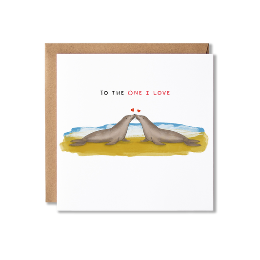 Anniversary card with illustration of two seals on a beach with the message To the One I Love.