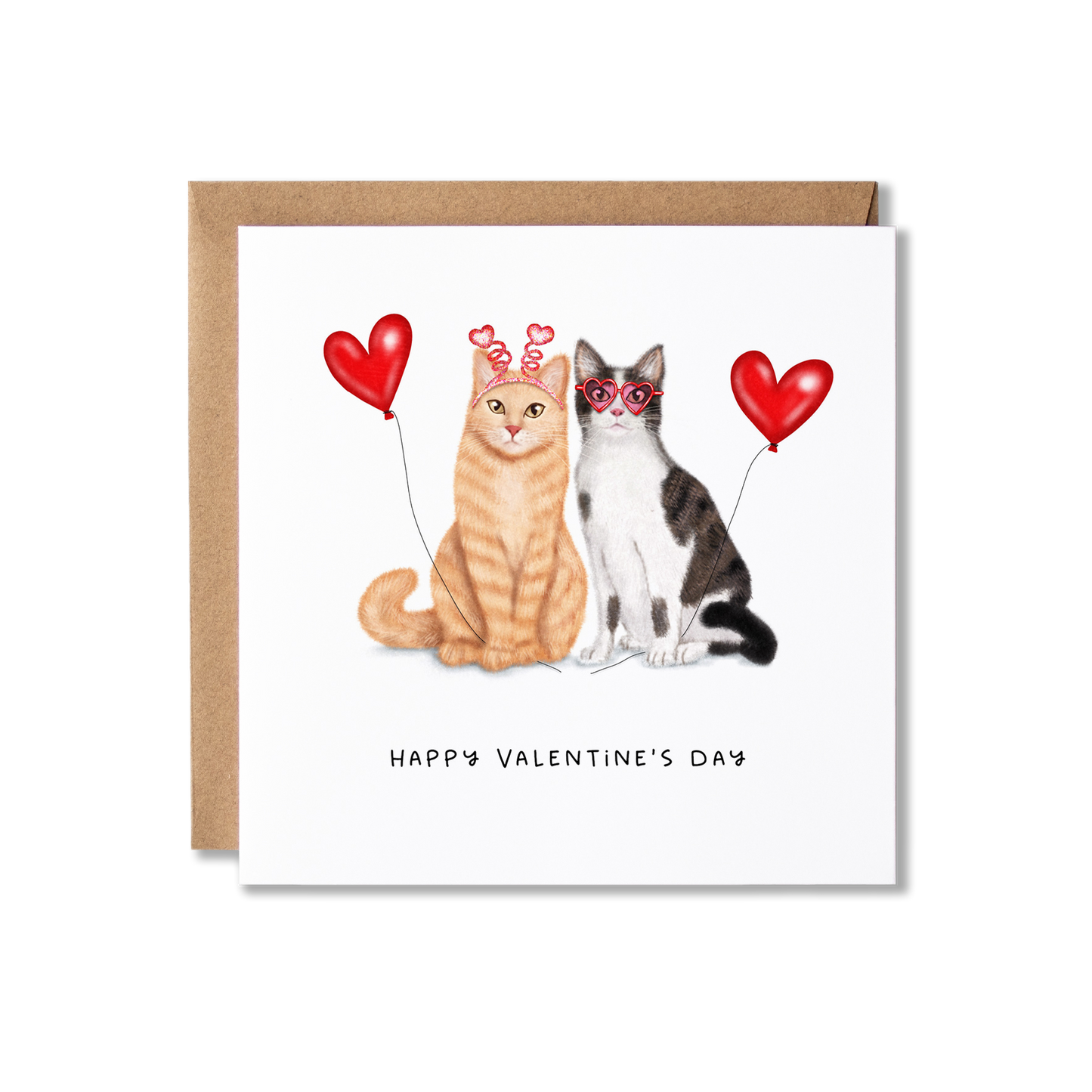 Couple of cats sitting with red heart shaped balloons with the words Happy Valentine's Day underneath.