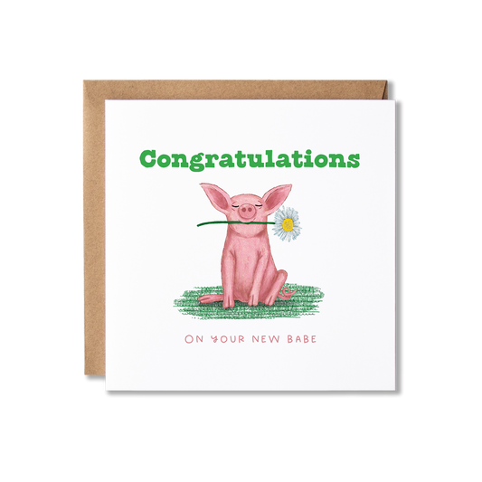Congratulations card with illustration of a piglet holding a daisy in it's mouth sitting on some grass with the message Congratulations on your New Babe.