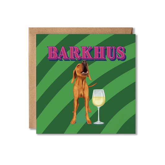Greeting card with a dog and wine glass illustration on a green striped background with 'BARKHUS' text.