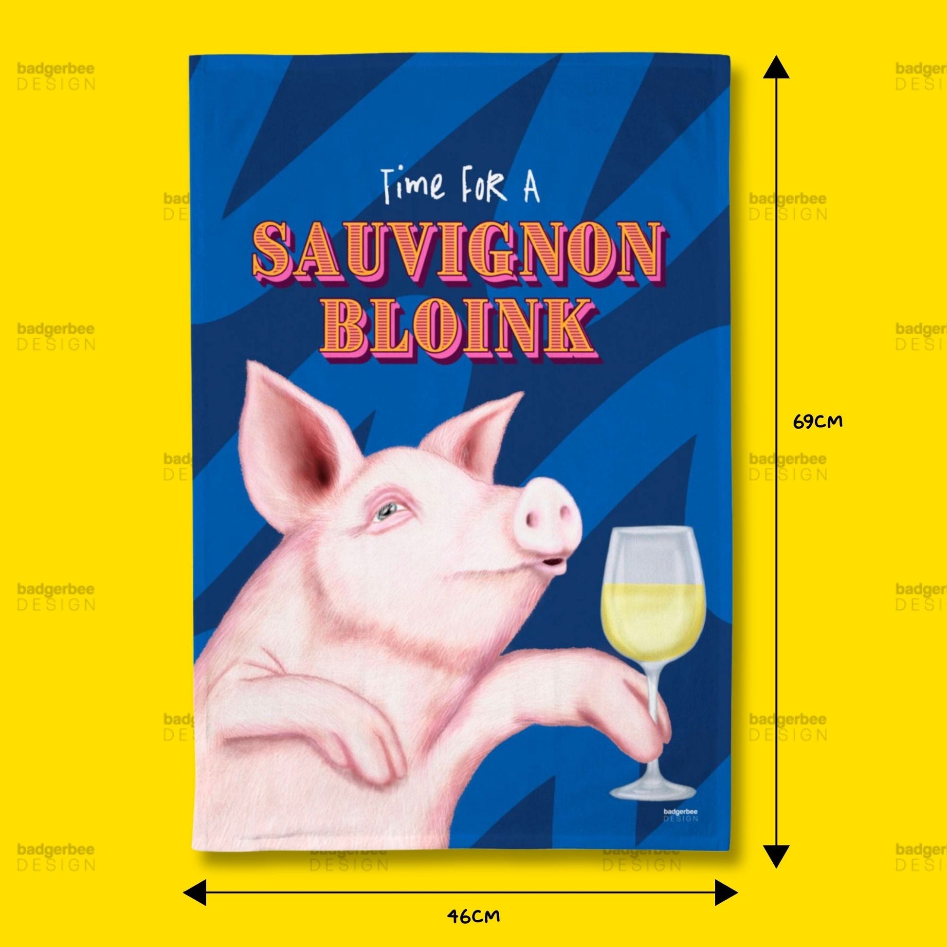 A rectangular printed tea towel with an illustration of a pig holding a glass of white wine on a blue striped background, with the text 'Time FOR A SAUVIGNON BLOINK.' The image includes dimension arrows and labels showing 69 cm height and 46 cm width, set against a bright yellow background with repeated 'Badgefree' watermarks.