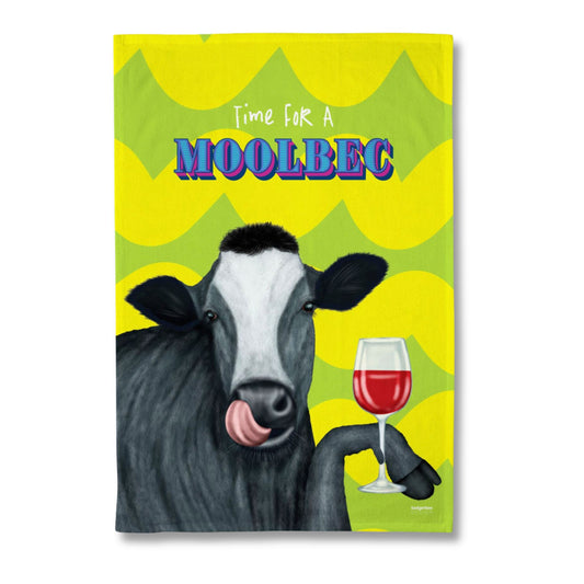 A rectangular printed Tea Towel featuring a black-and-white cow holding a glass of red wine, with the text 'Time For A MOOLBEC' above it. The background is bright yellow with green wavy shapes.