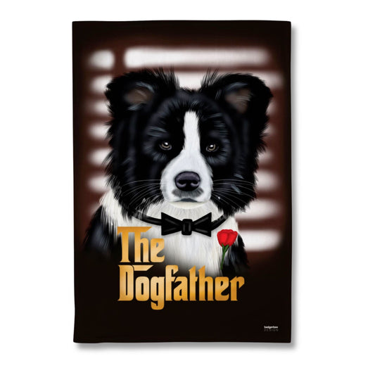 A rectangular printed tea towel featuring a stylized portrait of a black-and-white dog wearing a black bow tie and holding a red rose, with the text 'The Dogfather' in gold at the bottom. The artwork is shown against a plain white background.