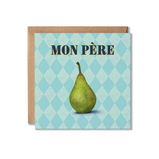 A square greeting card with a kraft envelope behind it, featuring the words “MON PÈRE” above a green pear on a light blue diamond-patterned background.