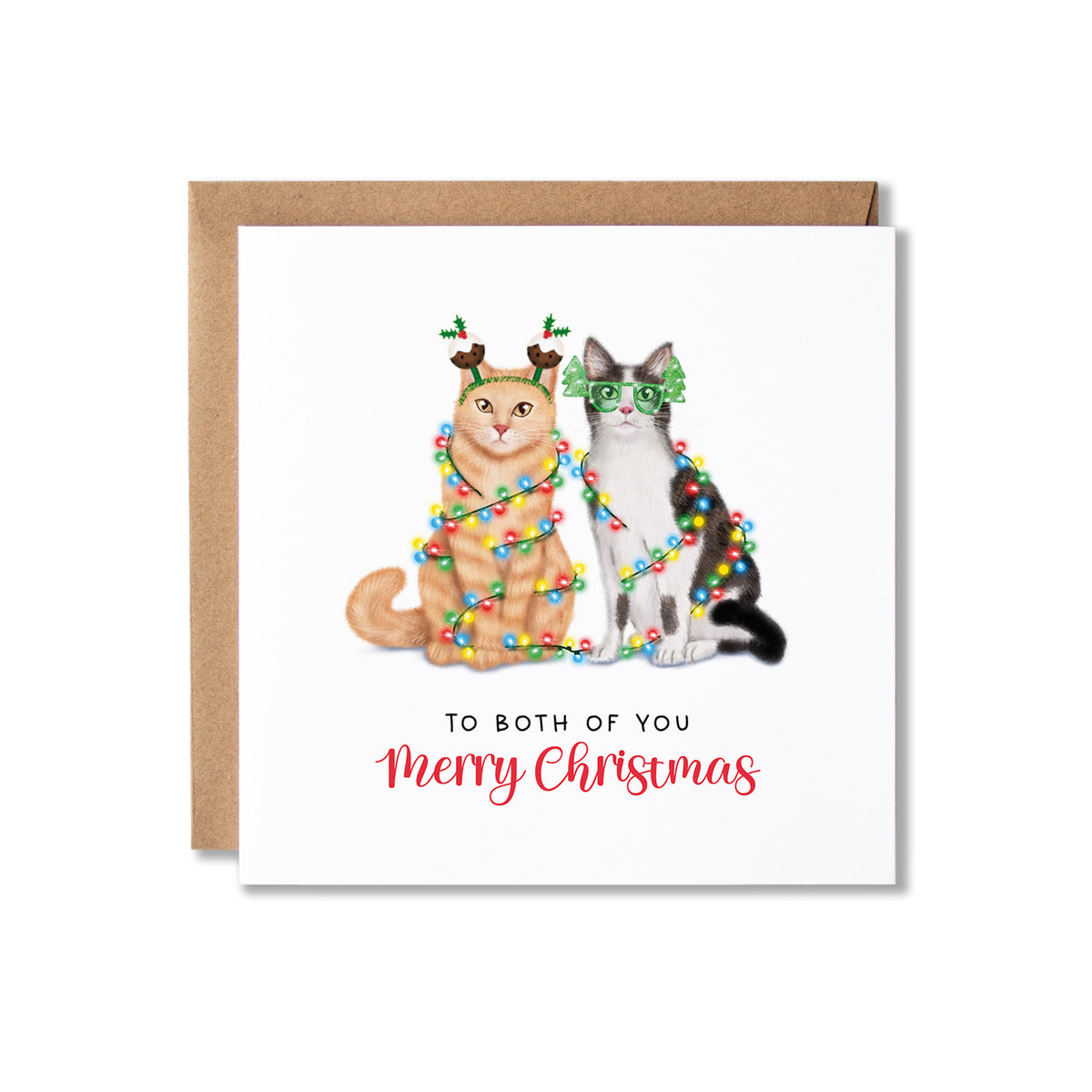 A square Christmas greeting card with a kraft envelope, featuring an illustration of two cats wrapped in colorful holiday lights and wearing green glasses and reindeer antlers, with the text 'TO BOTH OF YOU Merry Christmas' on a white card background.