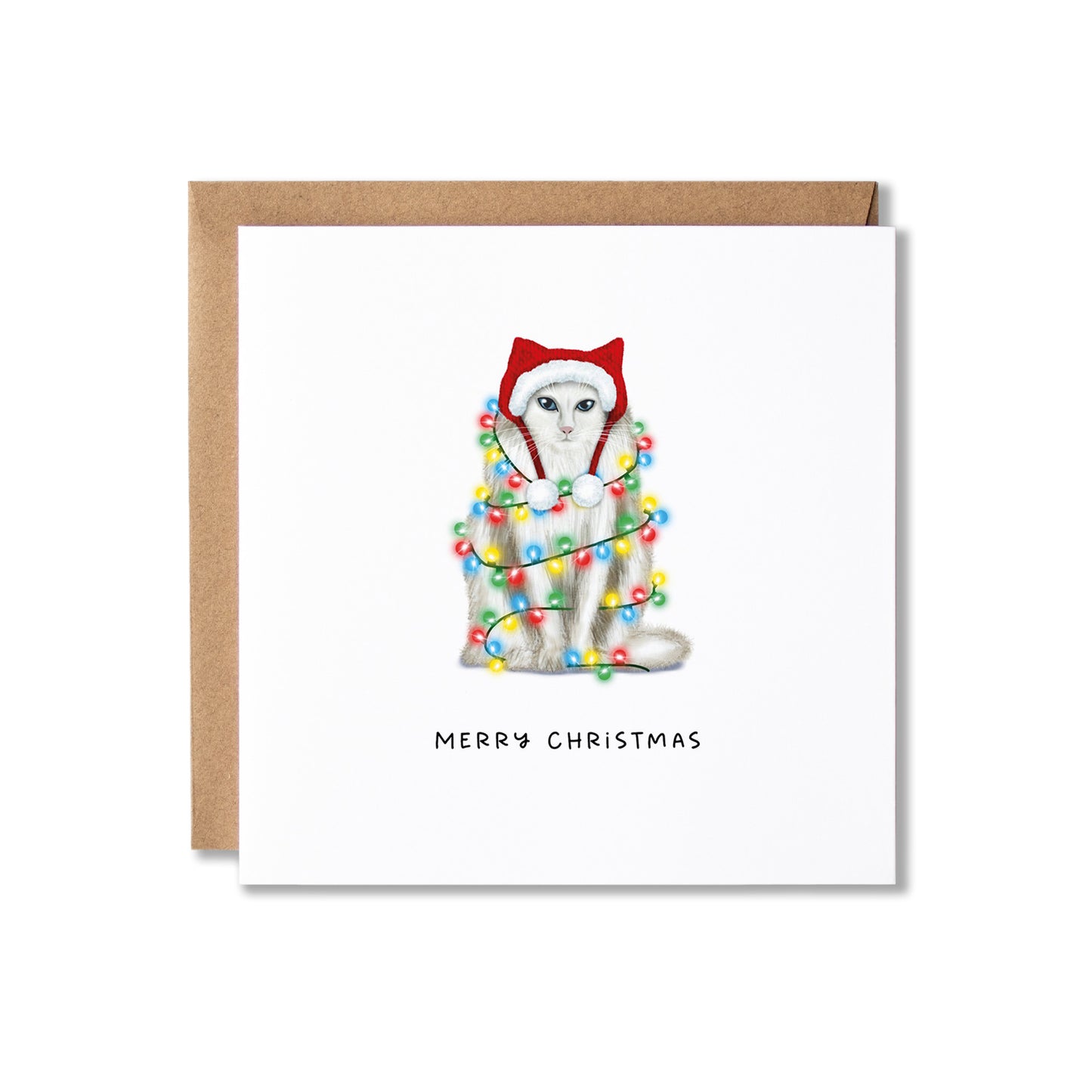 A square Christmas greeting card with a white front, featuring an illustration of a white cat wearing a red Santa hat and wrapped in multicolored holiday lights. The card is shown with a brown kraft envelope behind it on a white background.