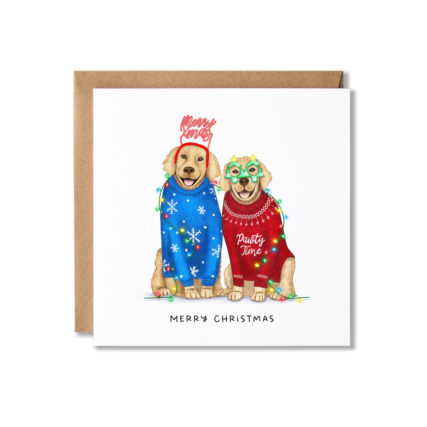 A square Christmas greeting card with a kraft envelope behind it. The card features an illustration of two golden retriever dogs wearing colorful holiday sweaters and string lights, with 'Merry Christmas' printed at the bottom.