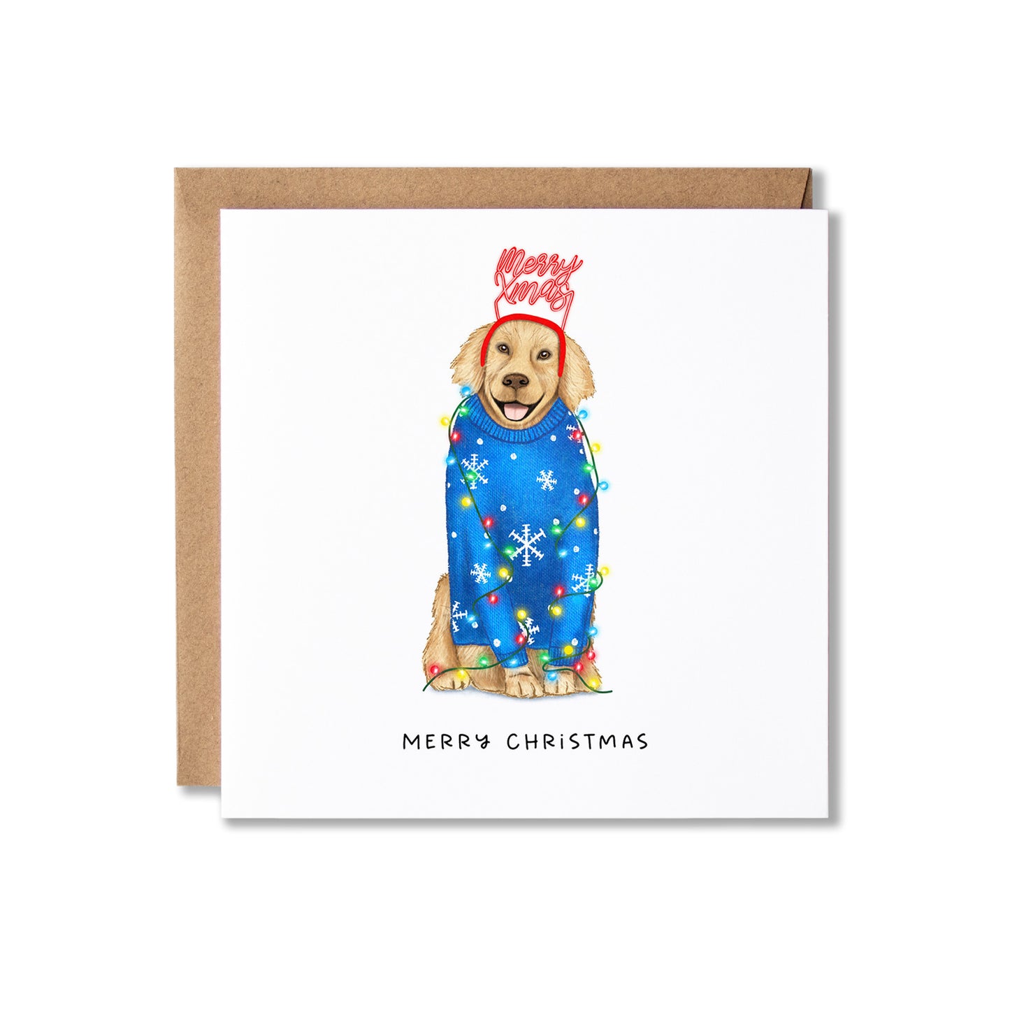 A square Christmas greeting card with a brown kraft envelope behind it. The card features an illustration of a golden retriever wearing a blue Christmas sweater with snowflakes and colorful holiday lights, topped with a red 'Merry Christmas' hat.