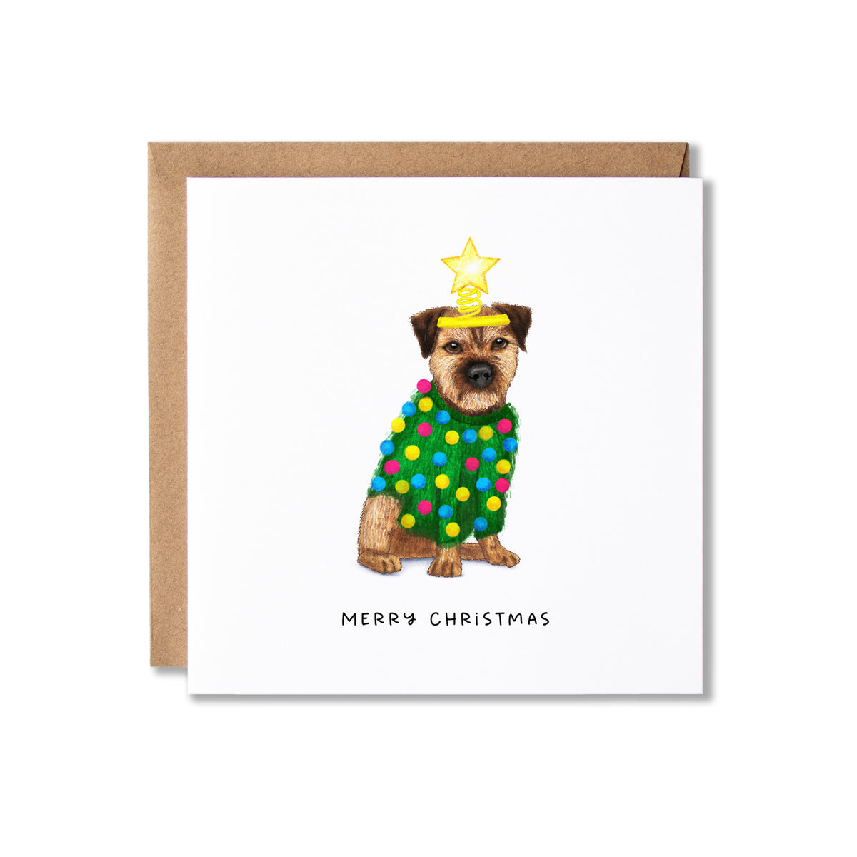 A square white Christmas greeting card with a brown kraft envelope behind it. The card features an illustration of a Border Collie dog wearing a colourful Christmas tree decoration sweater and a gold star on its head, with the text 'MERRY CHRISTMAS' printed below.