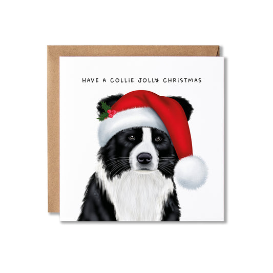 A square Christmas greeting card with a brown kraft envelope behind it. The card features an illustration of a black and white collie wearing a red Santa hat with green holly leaves, and the text 'HAVE A COLLIE JOLLY CHRISTMAS' above the dog.