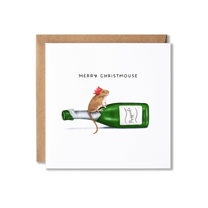A square white greeting card with a brown kraft envelope behind it, featuring an illustration of a small brown mouse wearing a red crown paper hat sitting on a green bottle of 'Prosqueako'. The card reads 'MERRY CHRISTMOSE' above the illustration.