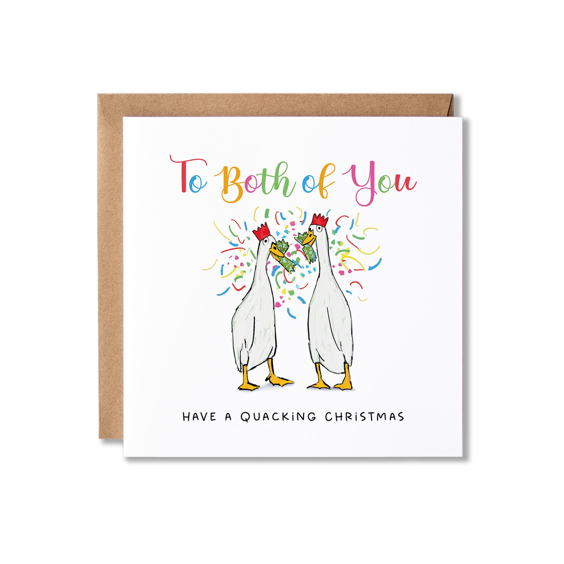 A white greeting card with a brown kraft envelope behind it, featuring an illustration of two quacking ducks with colorful confetti and the text 'To Both of You' and 'HAVE A QUACKING CHRISTMAS'.