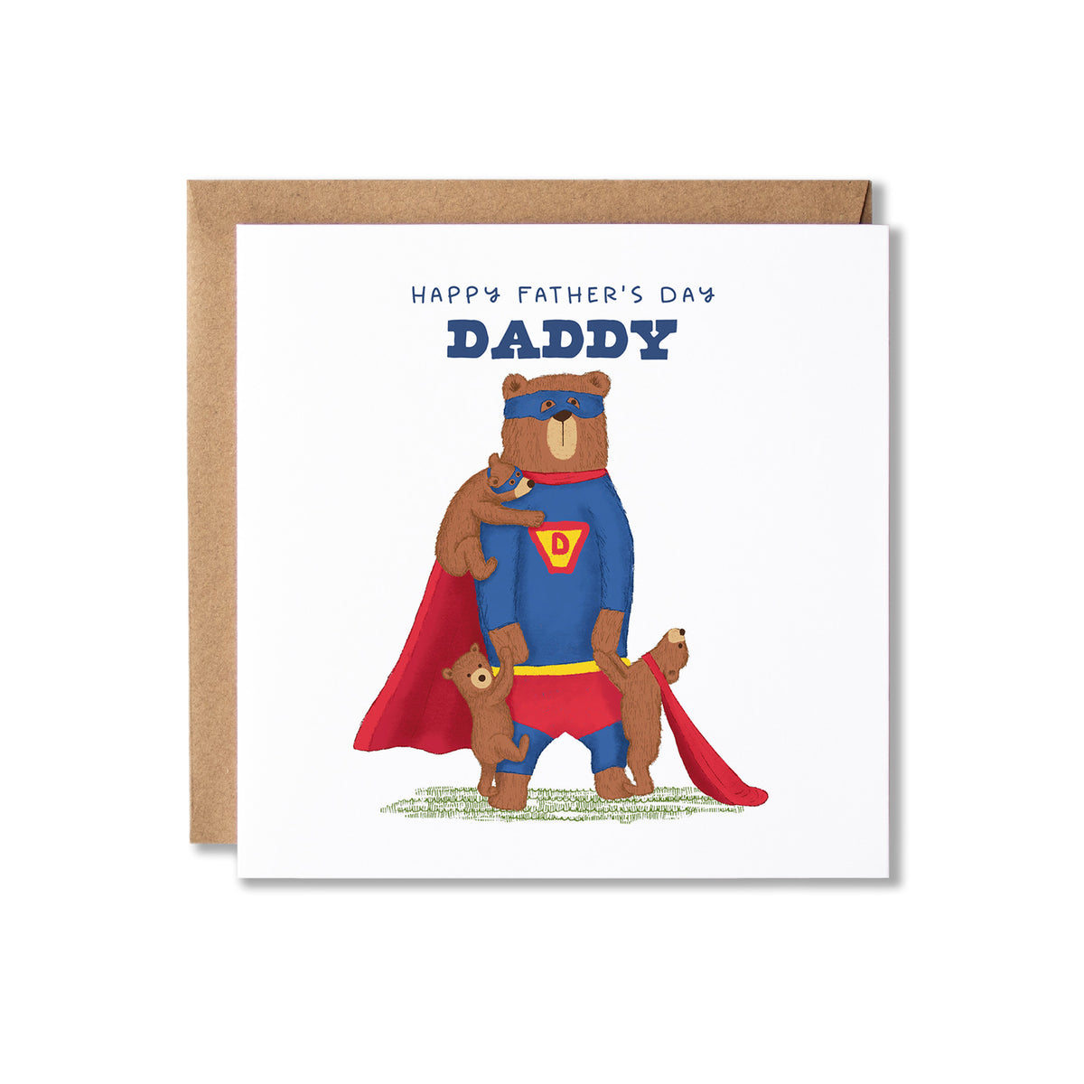 A square white Father's Day greeting card with a kraft brown envelope behind it. The card features an illustration of a bear dressed as a superhero in a blue suit with a red cape, holding three bear cubs, with the text 'HAPPY FATHER'S DAY DADDY' above.