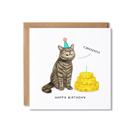 Birthday card with illustration of a tabby cat sat grinning in a green party hat with a stack of cheeses in front of it with a single candle so looks like a cake, saying Cheese and the message Happy Birthday.