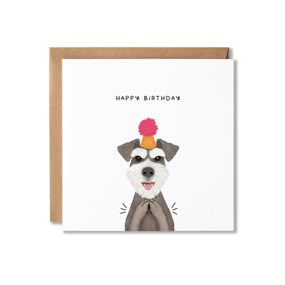Birthday card with illustration of a Schnauzer dog in an orange party hat with a pink bobble on top, clapping with the message Happy Birthday.
