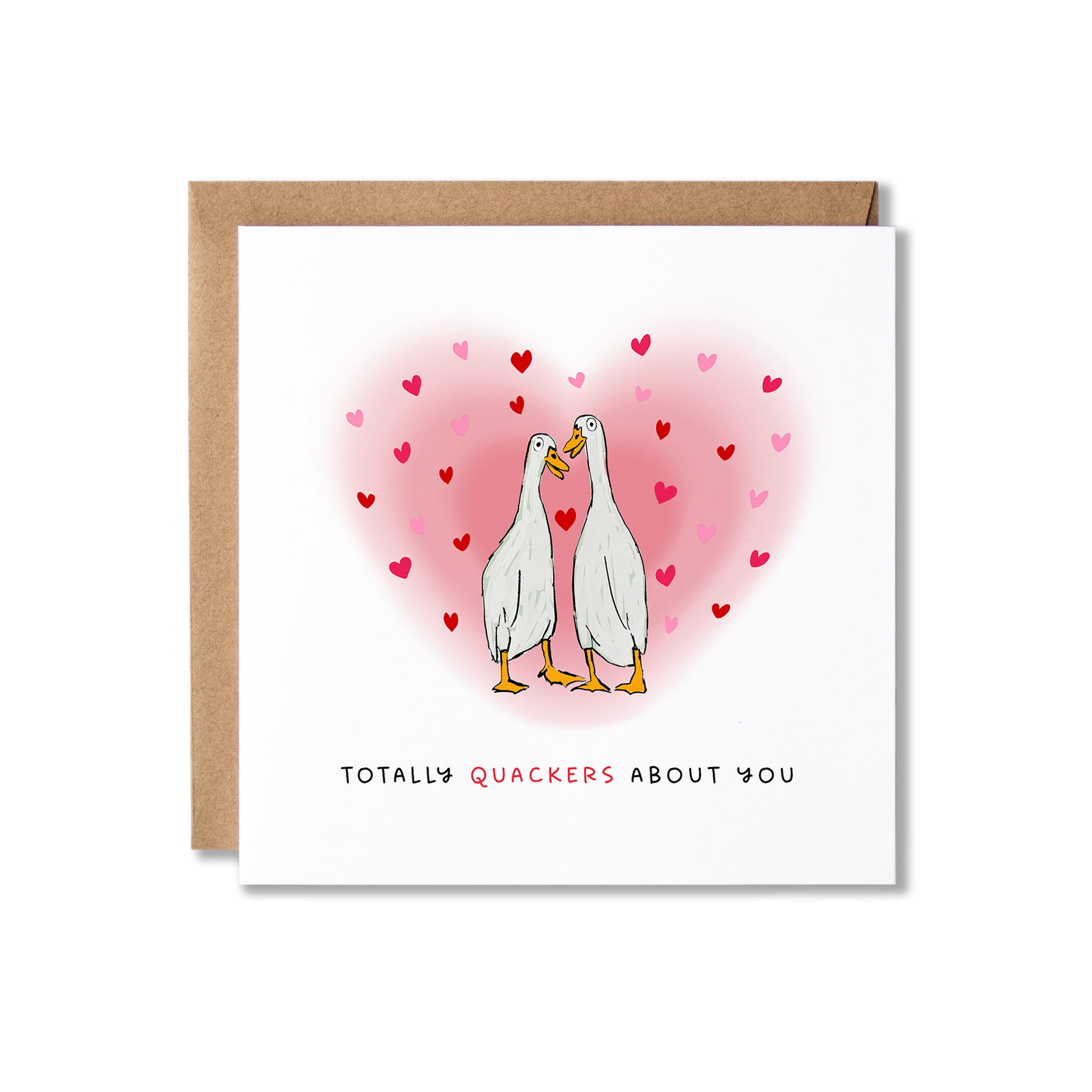 Greeting card with illustration of two white ducks looking at each other surrounded by a hug pink heart with the message Totally Quackers About You.