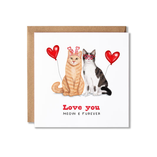 A square greeting card with a brown kraft envelope, featuring an illustration of an orange tabby cat and a black-and-white cat holding red heart-shaped balloons, with the text 'Love you' and 'MEOW & FUREVER' below.