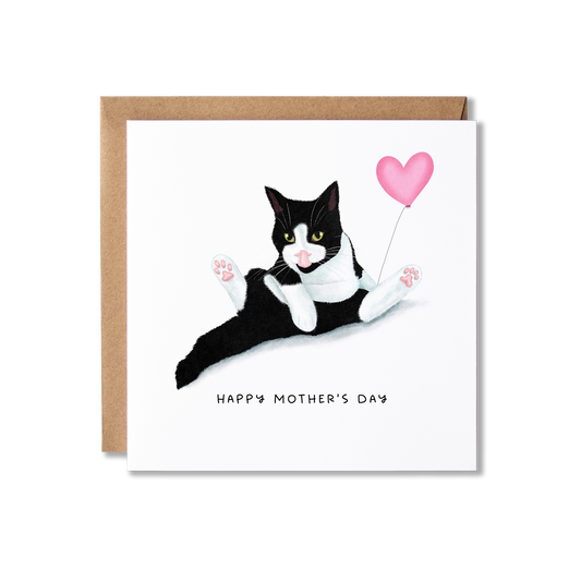 Mother's Day card with illustration of a black and white cat sat in a funny position having a wash holding a pink heart balloon with the message Happy Mother's Day.