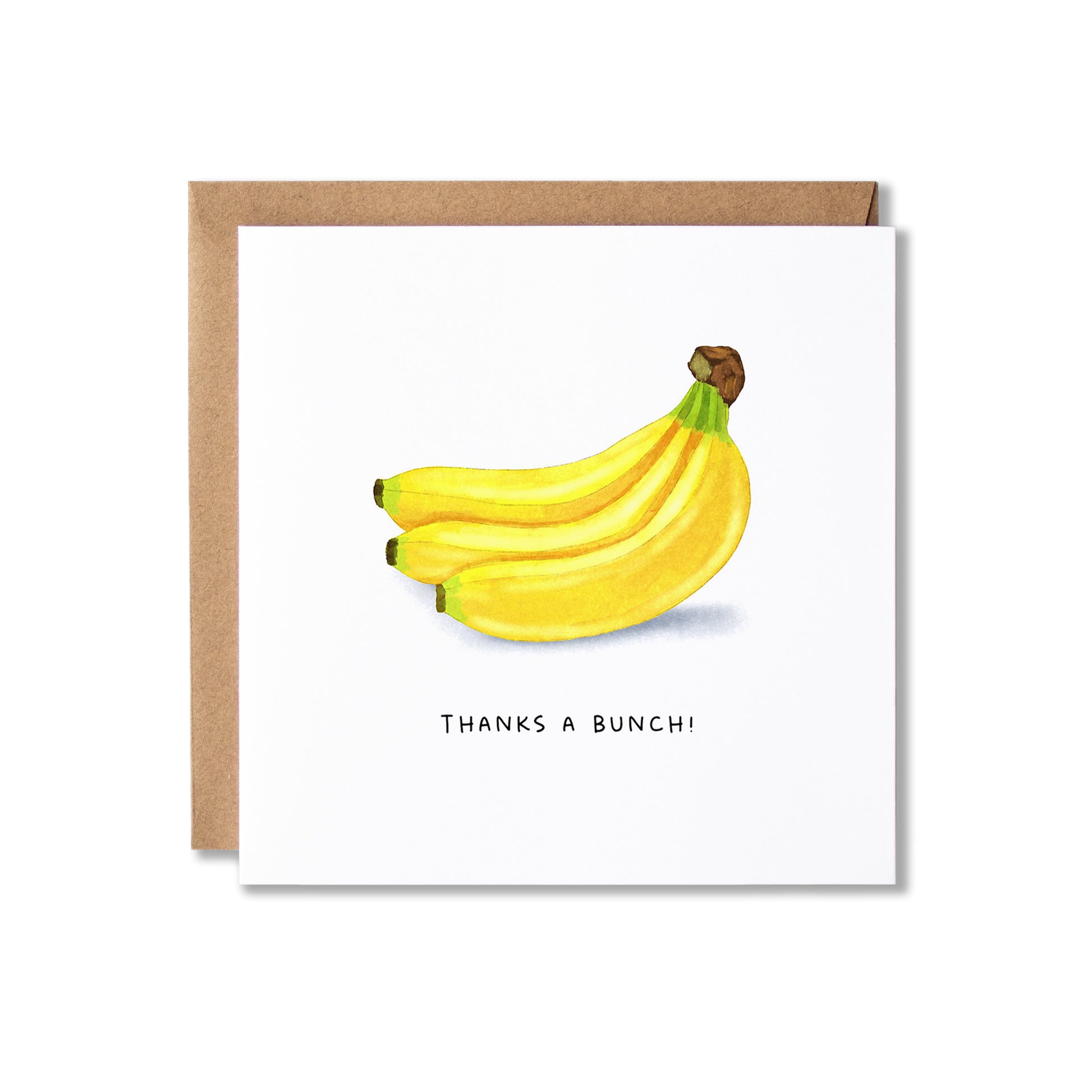 A square white greeting card with a watercolor illustration of three yellow bananas and the printed phrase 'THANKS A BUNCH!' below, shown with a brown kraft envelope behind it on a light gray background.