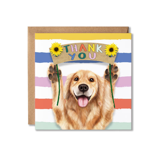 A square greeting card with a kraft envelope behind it, featuring a golden retriever holding a sign that says THANK YOU, decorated with two yellow sunflowers, on a white background.