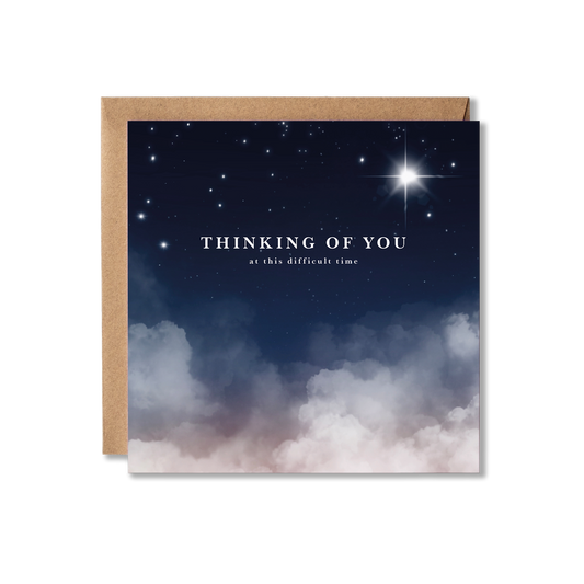 Greeting card with starry night design and 'Thinking of You' text