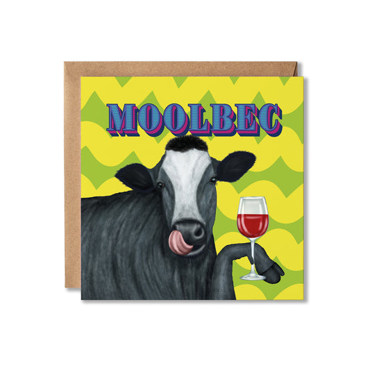 A square greeting card with a kraft envelope behind it, featuring a cartoon cow holding a glass of red wine against a yellow and green wavy background, with the word 'MOOLBEC' in large stylized letters at the top.