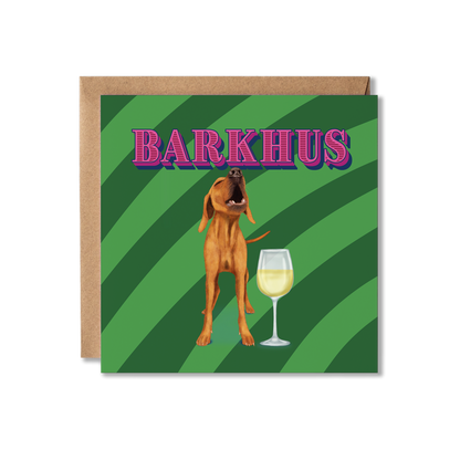 Greeting card with a dog and wine glass illustration on a green striped background with 'BARKHUS' text.