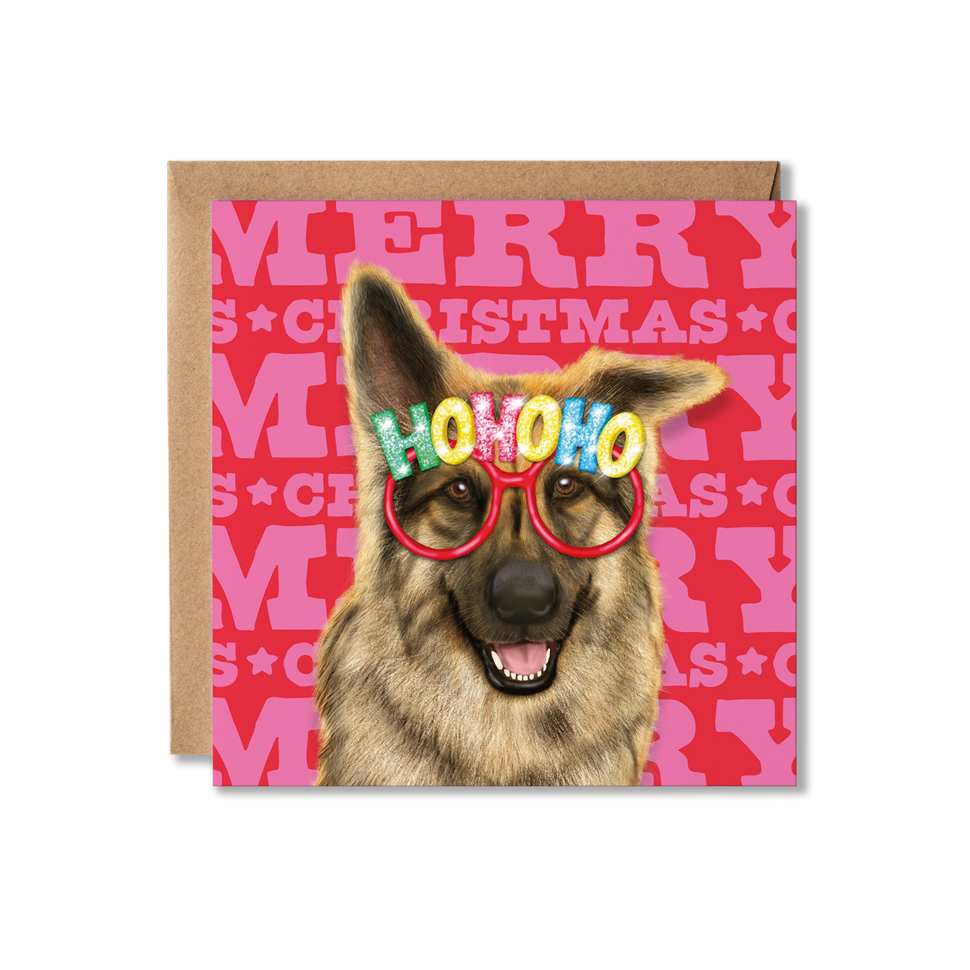 A square Christmas greeting card with a brown kraft envelope behind it. The card features a German Shepherd wearing red novelty glasses with the word 'HOHOHO' in colorful letters, set against a bright pink background with the words 'MERRY CHRISTMAS' in a repeating pattern.