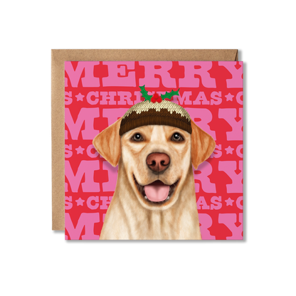 A yellow Labrador dog in a Christmas pudding hat with a colourful Merry Christmas background