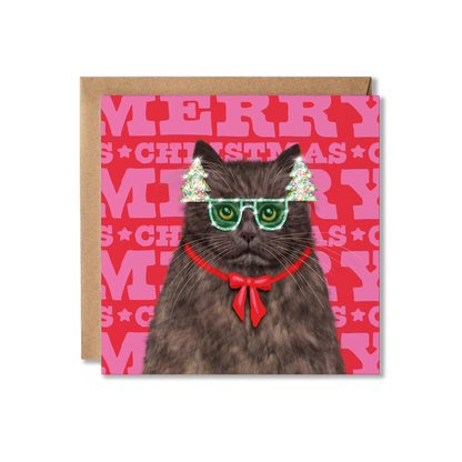 A British Long Hair Cat in Christmas tree glasses and a red bow with a colourful Merry Christmas background